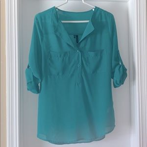 Maurices sheer green top.